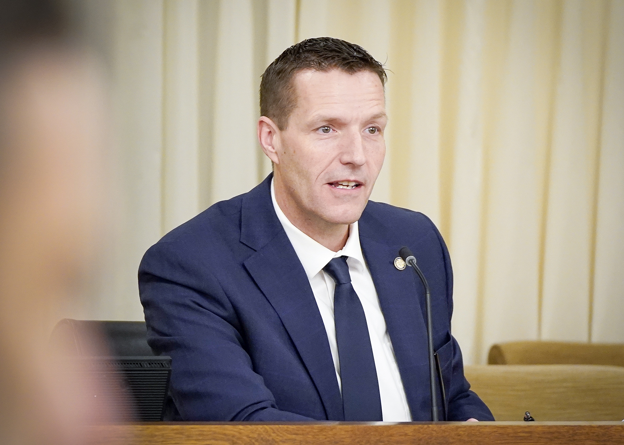 Rep. Ben Davis presents HF2 to the House State Government Finance and Policy Committee Jan. 23. The bill would require mandatory suspected fraud reporting by state agency employees. (Photo by Andrew VonBank)